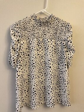 White and black animal print blouse